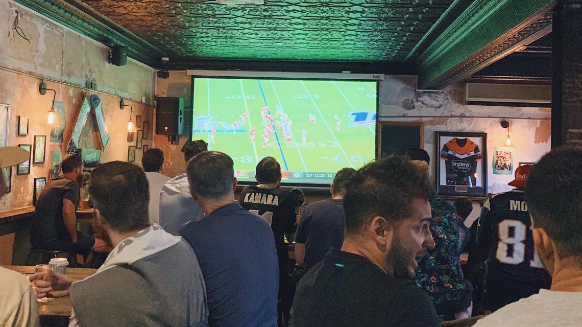 People watching Super Bowl at Public House Petersham